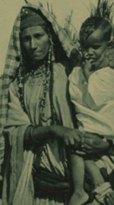 A Toubou woman and child of relatively "pure" stock. Note again the close resemblance both physically and culturally to Afro-Asiatic speakers. This affinity has also been confirmed genetically, as the Toubou have an ancestral makeup similar to that of the neighboring Sudanese "Arabs."