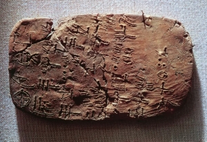 Tablet found at Haghia Triada, Crete, inscribed with symbols in Linear A. This undeciphered orthography was used by the Minoans, a people whom the ancient Egyptians depicted as resembling themselves and the Puntites. The script appears to match rather closely with the old writing system of northern Somalia. Note in particular the tablet's three open circles and Chinese-like ideograms, which are akin to the symbols Georges Révoil discovered (see El-Osbolé signs above) (University of Melbourne).