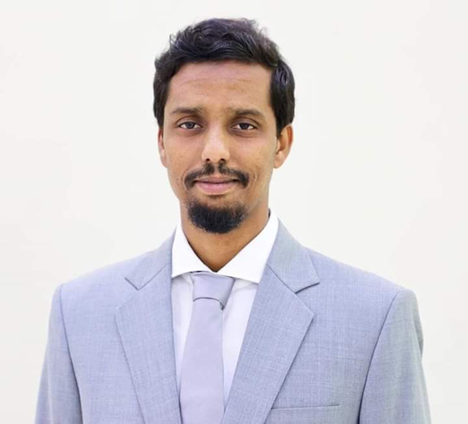Somali politician Asad Osman Abdullahi (Majerteen Darod clan), representing a "pure" Cushitic physiognomy. The ancient Cushitic settlers of the Great Lakes region were described as "tall, bearded, long-haired, and 'red' in colour," and thus would likely have had a similar phenotype. However, their great height surpassed that of most other Afro-Asiatic-speaking populations, except for the Tuareg Berbers.
