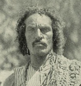 A Bisharin Beja man with a physiognomy close to that of the ancient Cushites. Note the "Caucasoid" craniofacial structure and soft-textured hair.