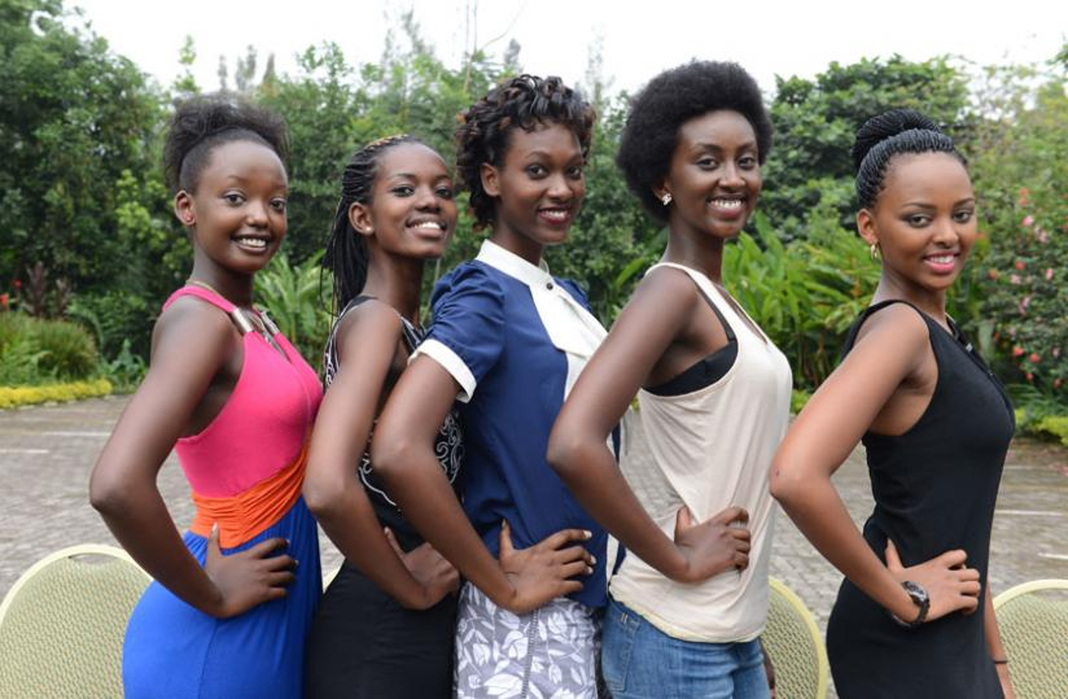 Tutsi beauty contestants in the Miss Rwanda pageant, representing the most attractive women in their Bantu community. The hair modifications (weaves, wigs, relaxing) and skin lightening regimens that typically precede such contests and other modeling engagements serve to give the Tutsi participants a more exotic appearance, approaching that of the Berber-admixed Fulani in Ziniare, Burkina Faso.